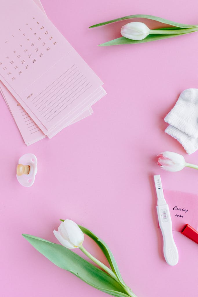 Pink Papers and White Tulips on Pink Surface