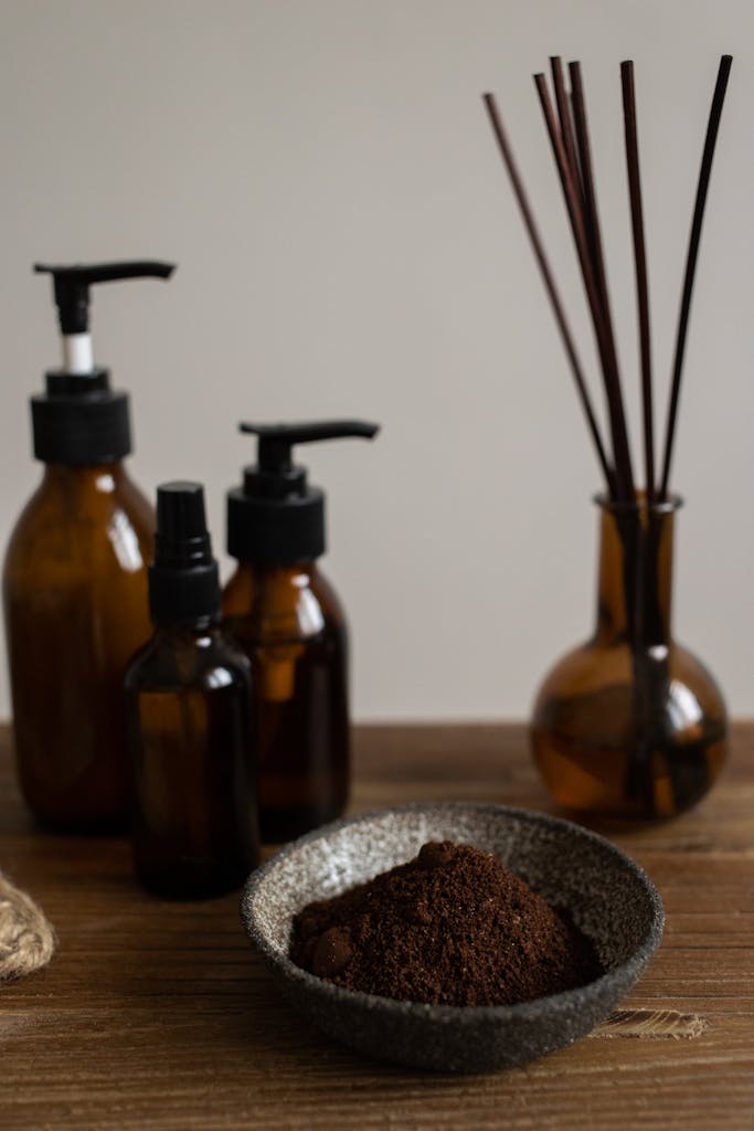 Bowl with Ground Coffee, Bottles and Incense Sticks