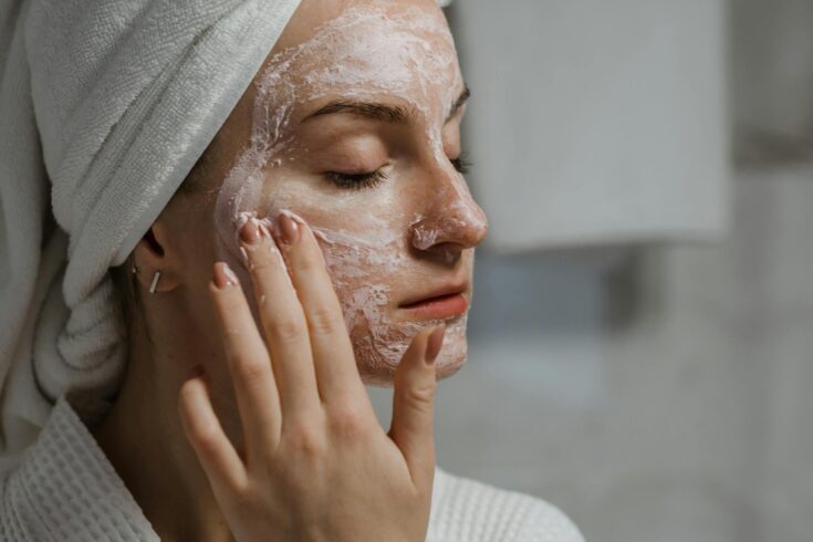 Close-Up Shot of a Woman Putting Clay Mask